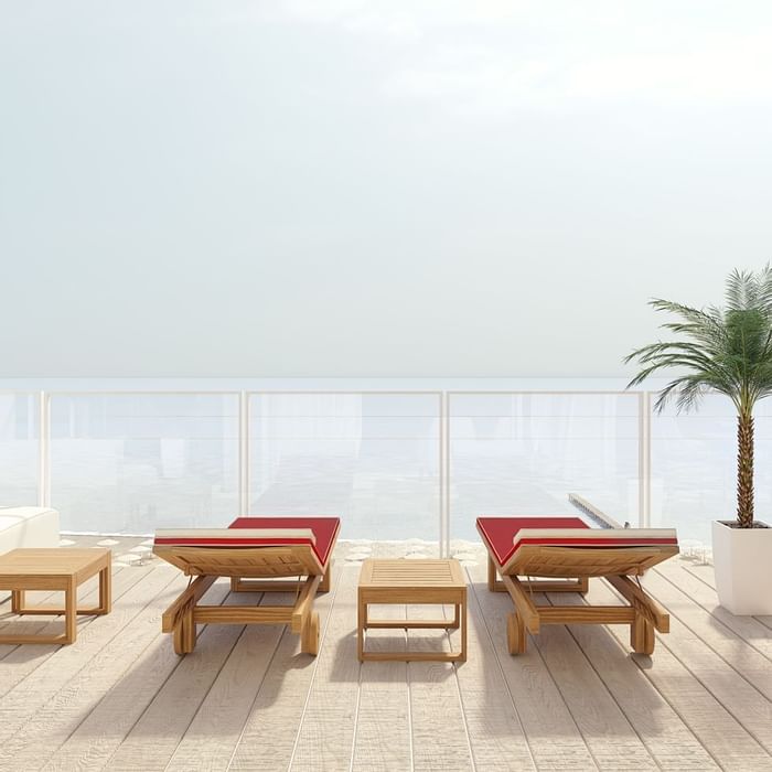 Loungers on a balcony area at Falkensteiner Hotels & Residences