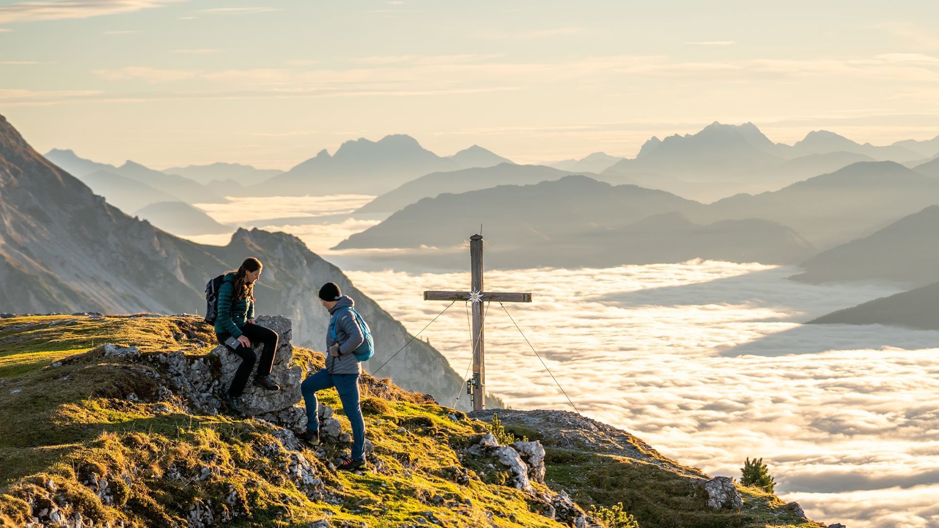 Couple enjoying the mountain view point near Falkensteiner Hotels & Residences