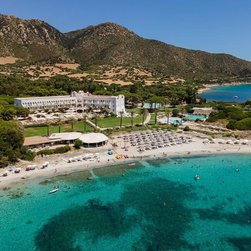 Aerial view of the cityscape with Falkensteiner Resort Capo Boi